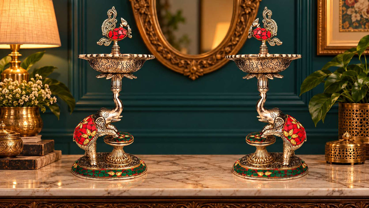 German silver peacock elephant samai lamp pair in a teal living room, mirrored facing each other