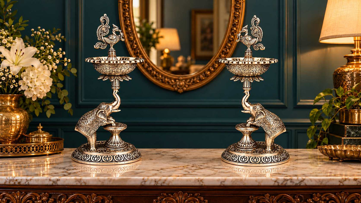 Elephant samai lamp pair viewed from the left angle on a marble console