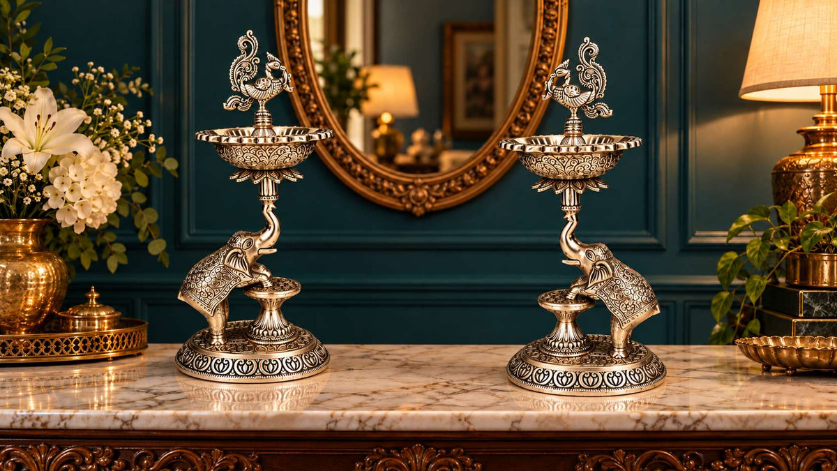 Elephant samai lamp pair viewed from the right angle on a marble console