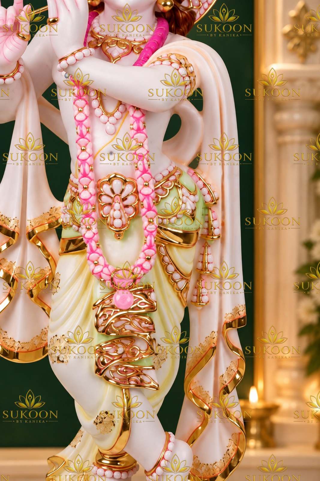 Makrana marble Krishna statue torso detail gold jewelry pink garland